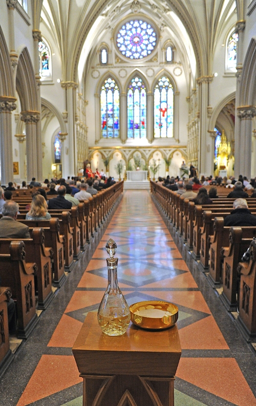 The Gifts before Communion at St Joseph Cathedral during Palm Sunday Mass. (Dan Cappellazzo/Staff Photographer)